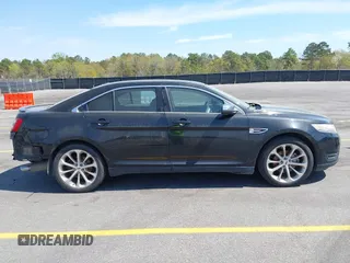 2015 Ford Taurus Limited with VIN 1FAHP2J81FG134973, listed as a IAAI auction lot 41845384 with 139,203 mi miles. Bid and sale history available at carsss.com. Image 13.