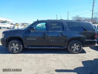 2009 Chevrolet Suburban LT w/1LT with VIN 1GNFK26309R273831, listed as a IAAI auction lot 41766177 with 999,999 mi miles. Bid and sale history available at carsss.com. Image 13.