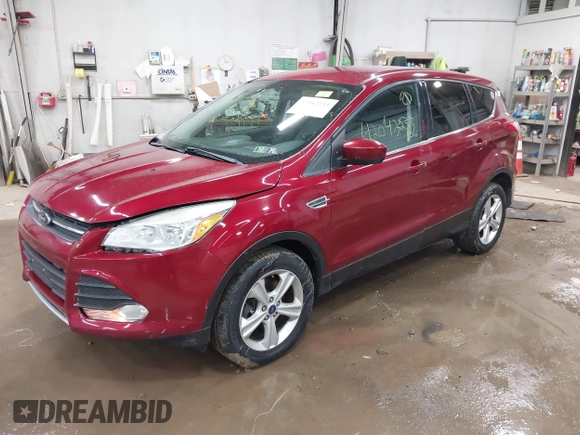 2013 Ford Escape SE with VIN 1FMCU9GX1DUC56361, listed as a IAAI auction lot 42042233 with 136,441 mi miles and . Bid and sale history available at DreamBid. Image 17.