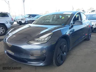 2018 Tesla Model 3 Long Range Battery with VIN 5YJ3E1EA9JF039615, listed as a IAAI auction lot 41756040 with 88,802 mi miles. Bid and sale history available at carsss.com. Image 19.