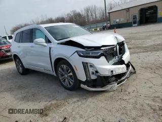 2022 Cadillac XT6 Premium Luxury with VIN 1GYKPFRS1NZ149557, listed as a Copart auction lot 49612165 with 31,425 mi miles and Salvage Title. Bid and sale history available at carsss.com. Image 4.