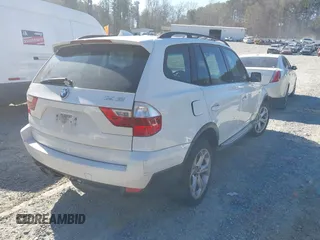 2009 BMW X3 xDrive30i with VIN WBXPC93499WJ30722, listed as a IAAI auction lot 41862997 with 170,028 mi miles. Bid and sale history available at carsss.com. Image 4.