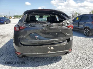 2020 Mazda CX-5 Touring with VIN JM3KFACM7L0766928, listed as a Copart auction lot 52494305 with Not Provided miles and Non Repairable. Bid and sale history available at DreamBid. Image 6.