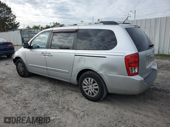 2012 Kia Sedona LX with VIN KNDMG4C79C6496785, listed as a Copart auction lot 73310344 with 130,243 mi miles and Salvage Title. Bid and sale history available at carsss.com. Image 2.
