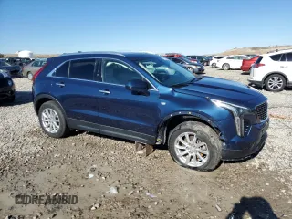2019 Cadillac XT4 AWD Luxury with VIN 1GYFZBR49KF159269, listed as a Copart auction lot 77130474 with 35,883 mi miles and Salvage Title. Bid and sale history available at carsss.com. Image 4.