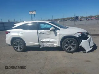 2018 Lexus RX 350 z VIN 2T2BZMCAXJC144930, wystawiony jako IAAI lot #41857778 z przebiegiem 108 191 mil mil oraz . Historia ofert i sprzedaży dostępna na DreamBid. Obrazek 13.