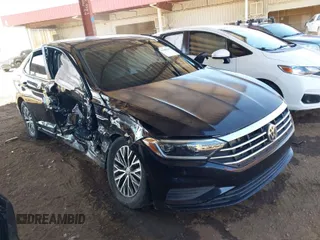 2019 Volkswagen Jetta SEL z VIN 3VWEB7BU1KM263071, wystawiony jako IAAI lot #41680639 z przebiegiem 56 265 mil mil oraz . Historia ofert i sprzedaży dostępna na DreamBid. Obrazek 1.