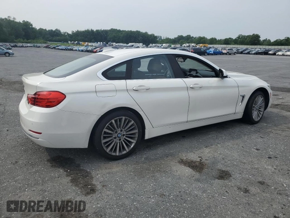 2015 BMW 4 Series 428i xDrive с VIN WBA4C9C52FD330306, выставлен на аукционе Copart как лот 60834435 с пробегом 167 034 миль миль и Списание • Salvage title. История ставок и продаж доступна на DreamBid. Изображение 3.