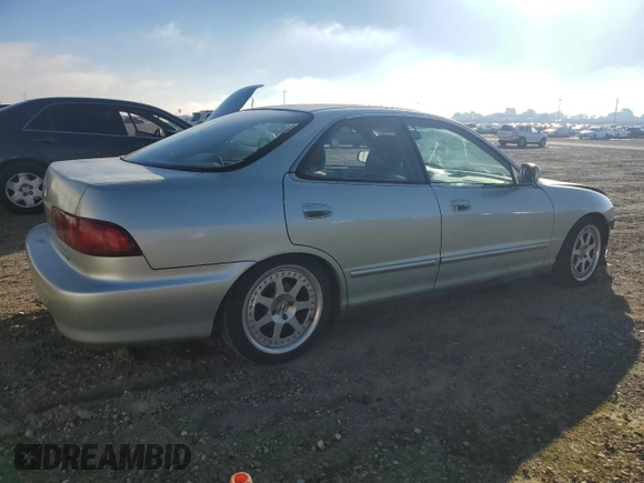 1998 Acura Integra LS with VIN JH4DB7659WS002591, listed as a Copart auction lot 84289584 with 316,458 mi miles and Salvage title. Bid and sale history available at DreamBid. Image 3.