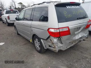 2005 Honda Odyssey EX with VIN 5FNRL38435B071998, listed as a IAAI auction lot 41808601 with 999,999 mi miles. Bid and sale history available at carsss.com. Image 3.