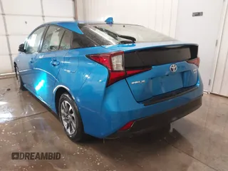 2021 Toyota Prius L Eco with VIN JTDKAMFU9M3135117, listed as a IAAI auction lot 41579736 with 35,795 mi miles and . Bid and sale history available at DreamBid. Image 3.