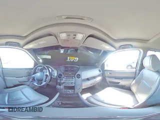 2013 Honda Pilot Touring with VIN 5FNYF4H95DB016049, listed as a Copart auction lot 61012725 with 104,252 mi miles and Salvage title. Bid and sale history available at DreamBid. Image 15.