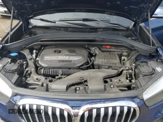 2021 BMW X1 xDrive28i with VIN WBXJG9C0XM5U47141, listed as a Copart auction lot 60645865 with 56,106 mi miles and Salvage title. Bid and sale history available at DreamBid. Image 12.