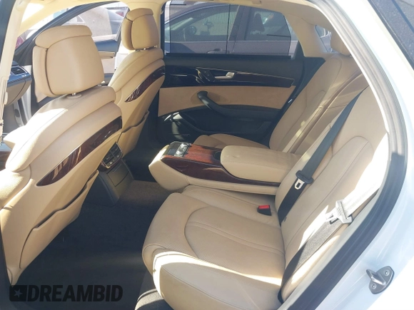 2014 Audi A8 3.0T z VIN WAURGAFDXEN006902, wystawiony jako IAAI lot #41099662 z przebiegiem 118 734 mil mil oraz . Historia ofert i sprzedaży dostępna na DreamBid. Obrazek 8.