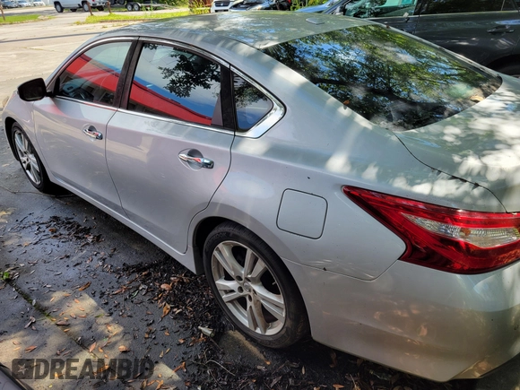 2016 Nissan Altima SL with VIN 1N4BL3AP8GC158954, listed as a IAAI auction lot 42718057 with 185,205 mi miles and . Bid and sale history available at DreamBid. Image 3.