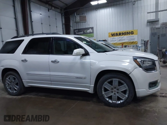 2016 GMC Acadia Denali with VIN 1GKKVTKD9GJ105401, listed as a IAAI auction lot 42055278 with 163,515 mi miles. Bid and sale history available at carsss.com. Image 13.