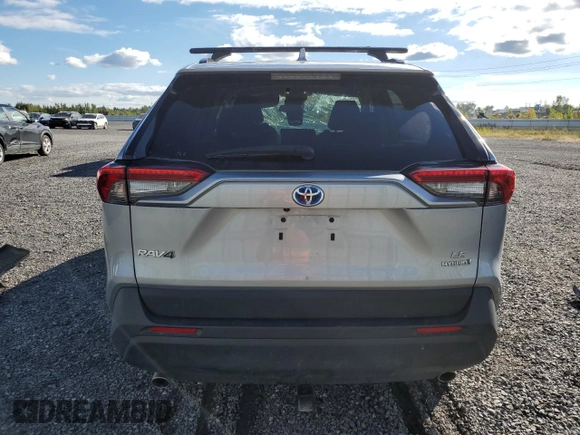 2023 Toyota RAV4 Hybrid XLE Premium with VIN 2T3BWRFV1PW157475, listed as a Copart auction lot 73371224 with 52,412 mi miles and Salvage title. Bid and sale history available at DreamBid. Image 6.