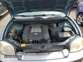 2003 Hyundai Santa Fe GLS with VIN KM8SC73D53U542081, listed as a Copart auction lot 62995765 with 154,187 mi miles and Salvage title. Bid and sale history available at DreamBid. Image 12.