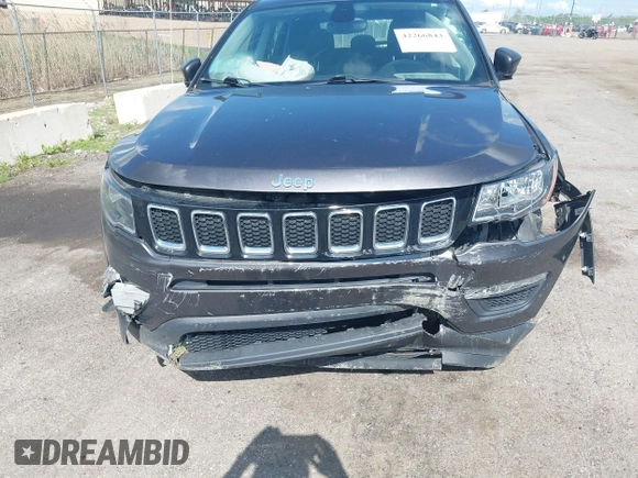 2018 Jeep Compass Sport z VIN 3C4NJCAB0JT267454, wystawiony jako IAAI lot #42266843 z przebiegiem 116 775 mil mil oraz . Historia ofert i sprzedaży dostępna na DreamBid. Obrazek 6.