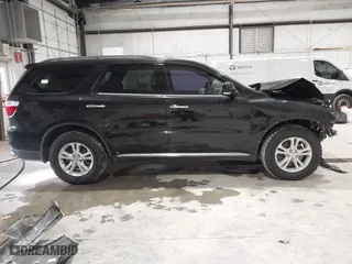 2013 Dodge Durango Crew with VIN 1C4SDJDT9DC670738, listed as a IAAI auction lot 41329419 with 149,520 mi miles. Bid and sale history available at carsss.com. Image 14.