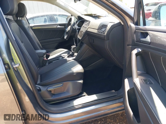 2023 Volkswagen Tiguan SE with VIN 3VVMB7AX4PM023080, listed as a IAAI auction lot 41963195 with 37,696 mi miles and . Bid and sale history available at DreamBid. Image 5.