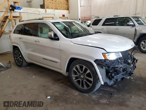 2017 Jeep Grand Cherokee Overland z VIN 1C4RJFCG8HC809868, wystawiony jako Copart lot #64056155 z przebiegiem 54 136 mil mil oraz Szkoda całkowita • Salvage title. Historia ofert i sprzedaży dostępna na DreamBid. Obrazek 4.
