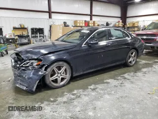2017 Mercedes-Benz E 300 Luxury with VIN WDDZF4JB0HA039244, listed as a Copart auction lot 56474805 with 135,674 mi miles and Salvage title. Bid and sale history available at DreamBid. Image 1.