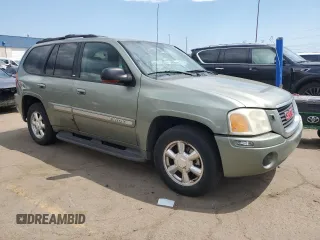 2003 GMC Envoy SLT with VIN 1GKDT13S032112192, listed as a Copart auction lot 54351985 with 297,007 mi miles and Clean Title. Bid and sale history available at carsss.com. Image 4.