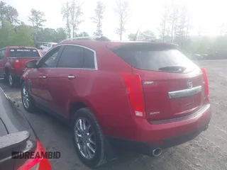 2014 Cadillac SRX Premium Collection with VIN 3GYFNDE36ES564140, listed as a IAAI auction lot 42070008 with 69,768 mi miles and . Bid and sale history available at DreamBid. Image 14.