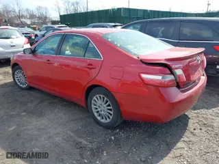 2007 Toyota Camry CE with VIN 4T1BE46K57U087077, listed as a IAAI auction lot 41727602 with 999,999 mi miles. Bid and sale history available at carsss.com. Image 3.