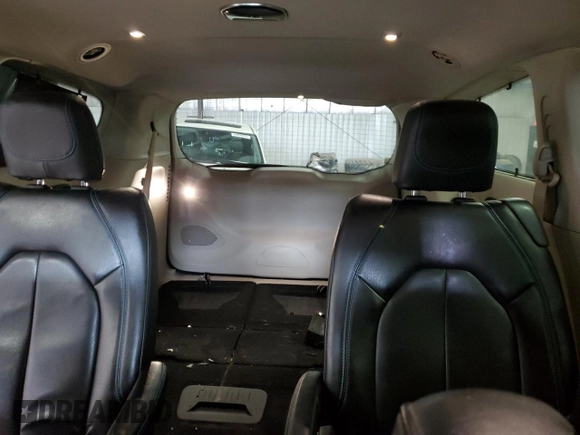 2021 Chrysler Pacifica Touring L with VIN 2C4RC1BGXMR588001, listed as a Copart auction lot 54562505 with 128,350 mi miles and Salvage title. Bid and sale history available at DreamBid. Image 10.