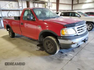 2003 Ford F-150 XL z VIN 2FTRF18W93CB06996, wystawiony jako Copart lot #42758725 z przebiegiem 142 428 mil mil oraz Szkoda całkowita • Salvage title. Historia ofert i sprzedaży dostępna na DreamBid. Obrazek 4.