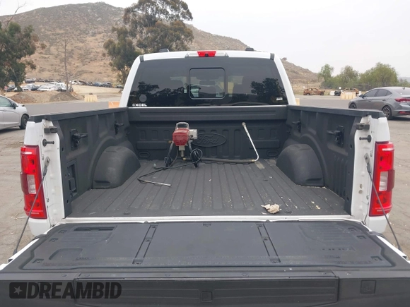 2021 Ford F-150 XL with VIN 1FTEW1CP7MKE89476, listed as a IAAI auction lot 42299954 with 152,473 mi miles and . Bid and sale history available at DreamBid. Image 16.