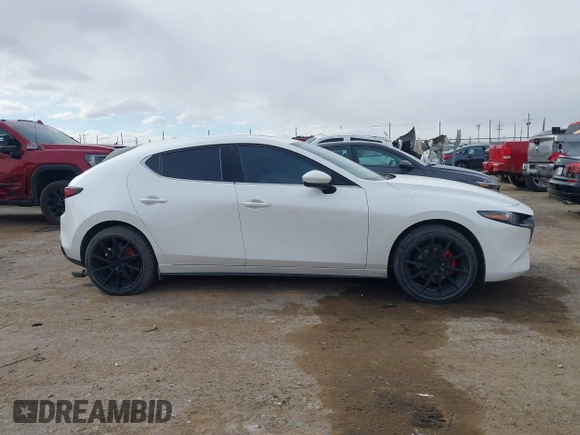 2021 Mazda 3 Premium with VIN JM1BPAML0M1302385, listed as a IAAI auction lot 41397521 with 55,907 mi miles and . Bid and sale history available at DreamBid. Image 12.