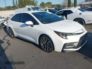 2021 Toyota Corolla SE with VIN 5YFS4MCE2MP068307, listed as a IAAI auction lot 41838172 with 82,638 mi miles. Bid and sale history available at carsss.com. Image 1.