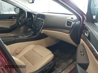 2016 Nissan Maxima 3.5 SV with VIN 1N4AA6APXGC445036, listed as a IAAI auction lot 41660079 with 119,287 mi miles. Bid and sale history available at carsss.com. Image 5.