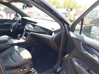 2021 Cadillac XT6 Premium Luxury with VIN 1GYKPDRS0MZ153523, listed as a IAAI auction lot 42770895 with 19,843 mi miles and . Bid and sale history available at DreamBid. Image 5.