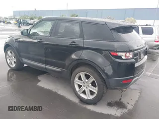 2014 Land Rover Range Rover Evoque Pure Plus z VIN SALVP2BG6EH903004, wystawiony jako IAAI lot #41923386 z przebiegiem 132 520 mil mil oraz . Historia ofert i sprzedaży dostępna na DreamBid. Obrazek 3.