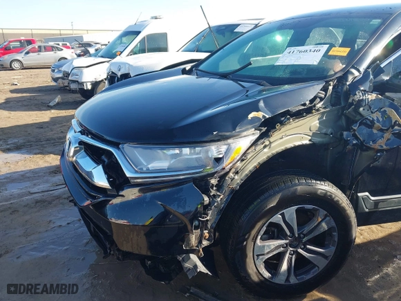 2018 Honda CR-V LX with VIN 2HKRW6H32JH217402, listed as a IAAI auction lot 41760340 with 69,515 mi miles. Bid and sale history available at carsss.com. Image 6.