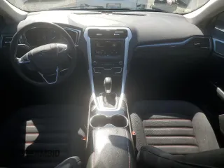 2016 Ford Fusion SE Hybrid z VIN 3FA6P0LU3GR173886, wystawiony jako Copart lot #60066015 z przebiegiem 140 328 mil mil oraz Szkoda całkowita • Salvage title. Historia ofert i sprzedaży dostępna na DreamBid. Obrazek 8.