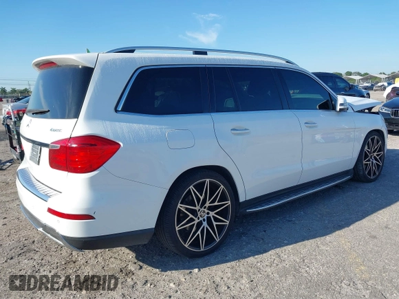 2014 Mercedes-Benz GL-Class GL 450 with VIN 4JGDF7CE1EA387056, listed as a IAAI auction lot 41899945 with 126,842 mi miles. Bid and sale history available at carsss.com. Image 4.