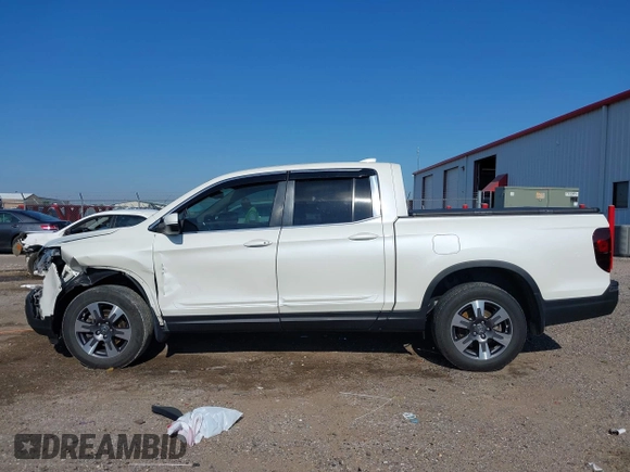 2017 Honda Ridgeline RTL-T z VIN 5FPYK3F69HB038048, wystawiony jako IAAI lot #42583177 z przebiegiem 183 564 mil mil oraz . Historia ofert i sprzedaży dostępna na DreamBid. Obrazek 15.