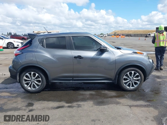 2015 Nissan Juke S with VIN JN8AF5MRXFT513258, listed as a IAAI auction lot 42213721 with 91,972 mi miles and . Bid and sale history available at DreamBid. Image 13.