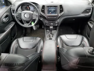 2020 Jeep Cherokee Trailhawk with VIN 1C4PJMBX2LD588381, listed as a Copart auction lot 56067055 with 82,467 mi miles and Salvage title. Bid and sale history available at DreamBid. Image 8.