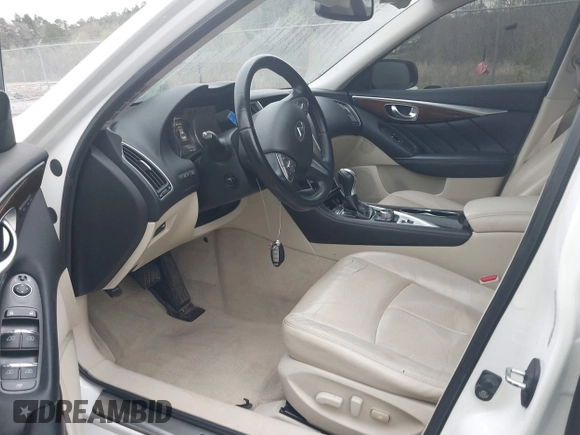 2015 Infiniti Q50 Premium z VIN JN1BV7AP9FM331131, wystawiony jako IAAI lot #41786108 z przebiegiem 176 874 mil mil oraz . Historia ofert i sprzedaży dostępna na DreamBid. Obrazek 5.