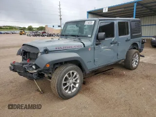 2014 Jeep Wrangler Unlimited Rubicon z VIN 1C4HJWFG0EL316513, wystawiony jako Copart lot #57182325 z przebiegiem 150 012 mil mil oraz Szkoda całkowita • Salvage title. Historia ofert i sprzedaży dostępna na DreamBid. Obrazek 1.