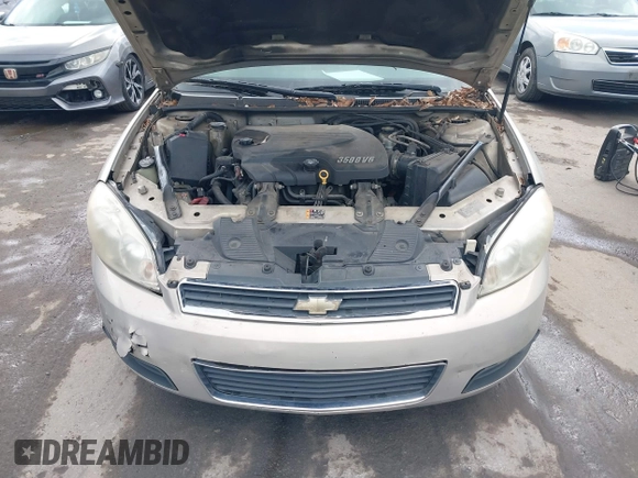 2011 Chevrolet Impala LT Retail with VIN 2G1WB5EKXB1142965, listed as a IAAI auction lot 41639702 with 249,396 mi miles and . Bid and sale history available at DreamBid. Image 10.