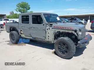 2021 Jeep Gladiator Mojave with VIN 1C6JJTEG8ML515686, listed as a IAAI auction lot 42217590 with 38,506 mi miles and . Bid and sale history available at DreamBid. Image 6.