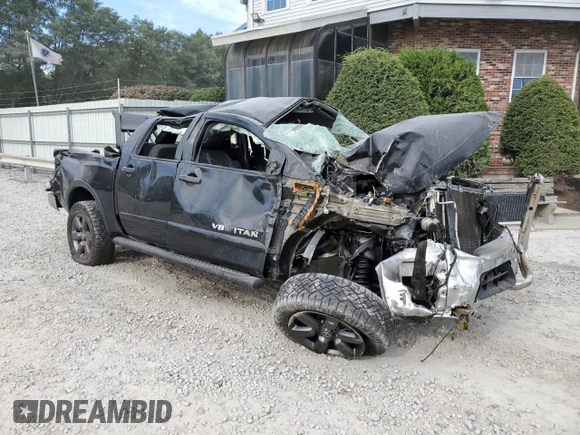 2015 Nissan Titan SL with VIN 1N6AA0EC5FN506114, listed as a Copart auction lot 74430454 with Not Provided miles and Salvage Title. Bid and sale history available at carsss.com. Image 4.