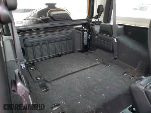 2021 Jeep Wrangler Rubicon z VIN 1C4HJXCG2MW665809, wystawiony jako Copart lot #84007354 z przebiegiem Nie podano mil oraz Szkoda całkowita • Salvage title. Historia ofert i sprzedaży dostępna na DreamBid. Obrazek 10.